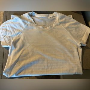 WHITE lululemon swiftly tech in size 4